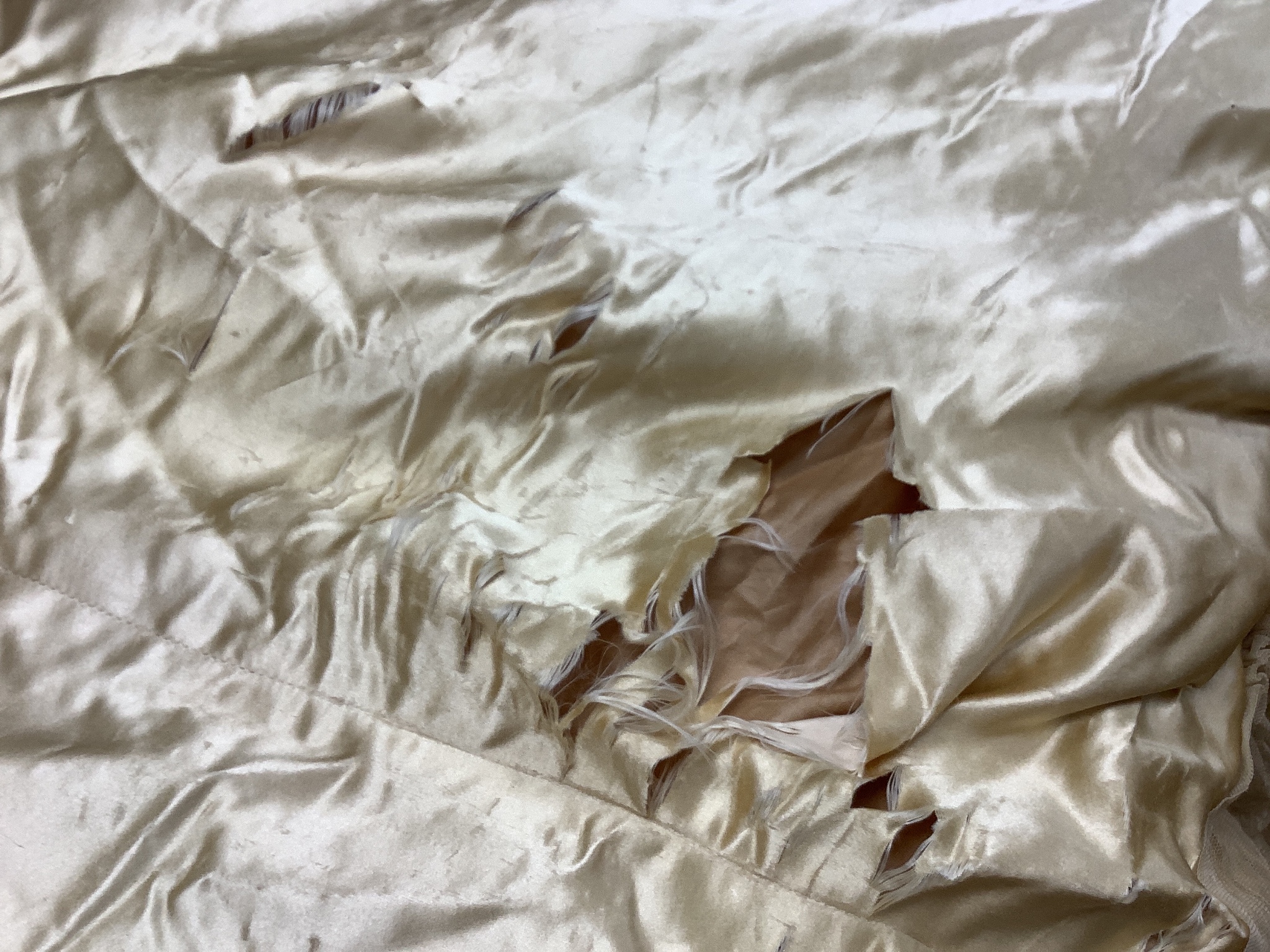 A Firth and Russell cream satin and lace wedding dress